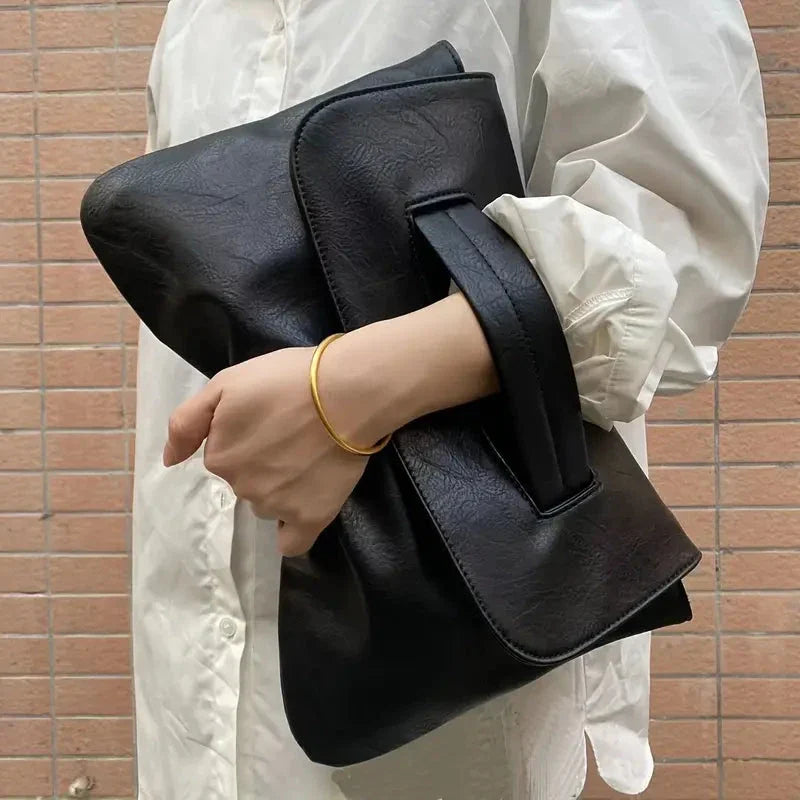 Kaelith - Elegant and versatile clutch bag